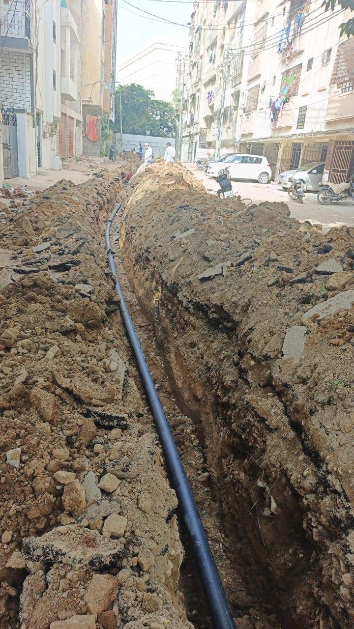 Pipeline laid in an open trench on a city street